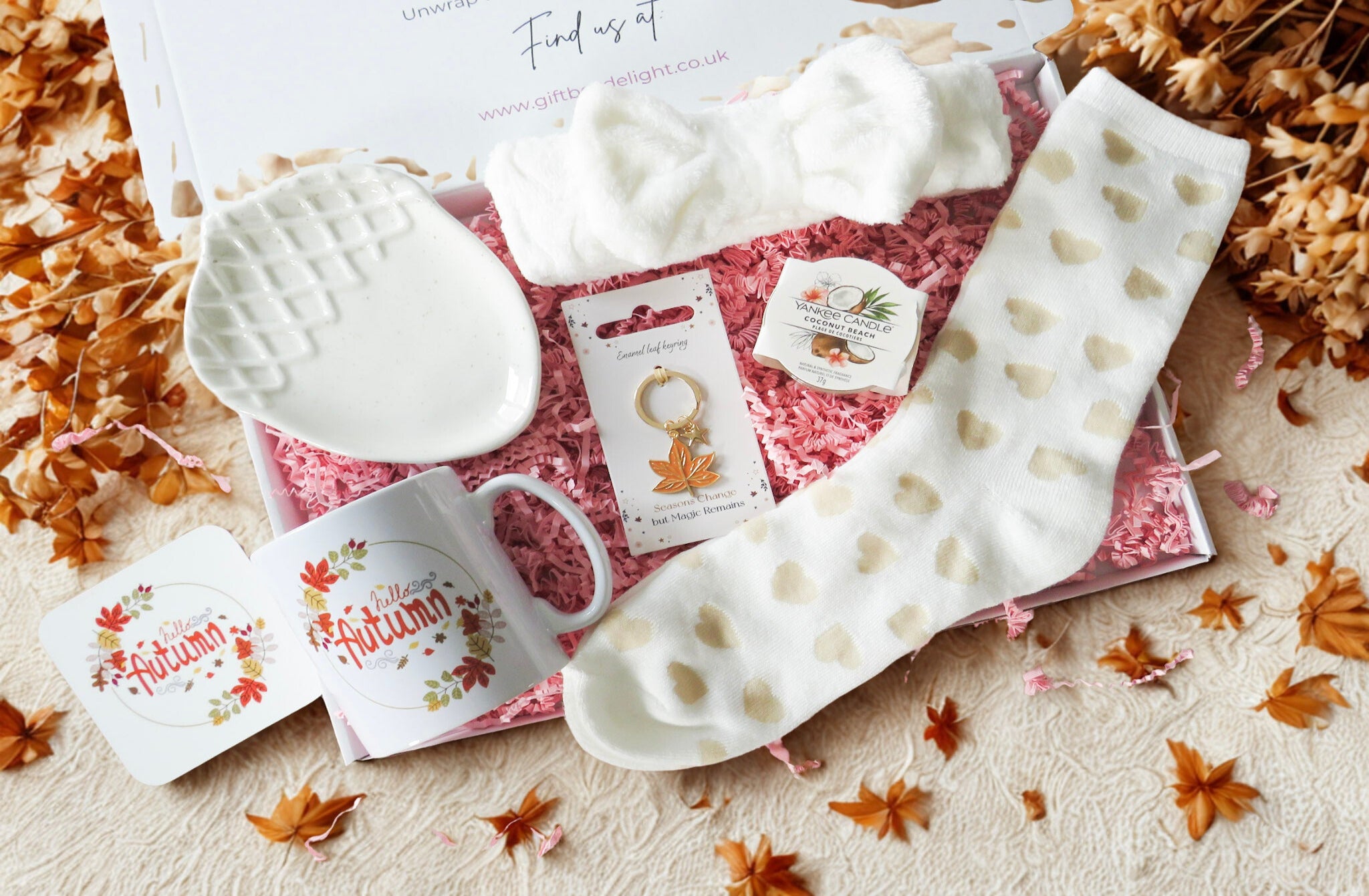 Gift set with hello autumn mug, coaster, white heart socks, autumn leaf keyring & Yankee coconut beach scented candle mini.