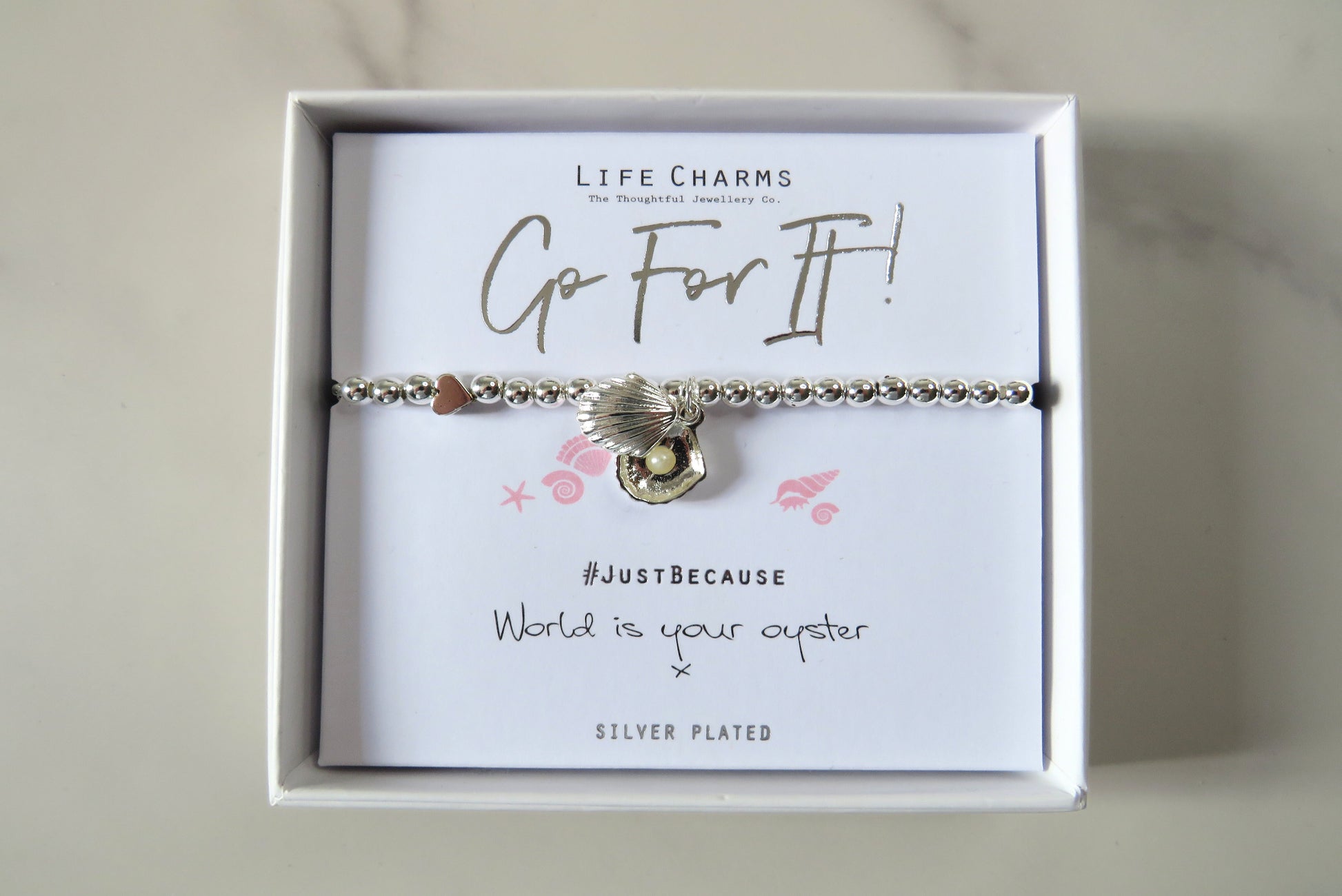 life charms go for it silver oyster bracelet.