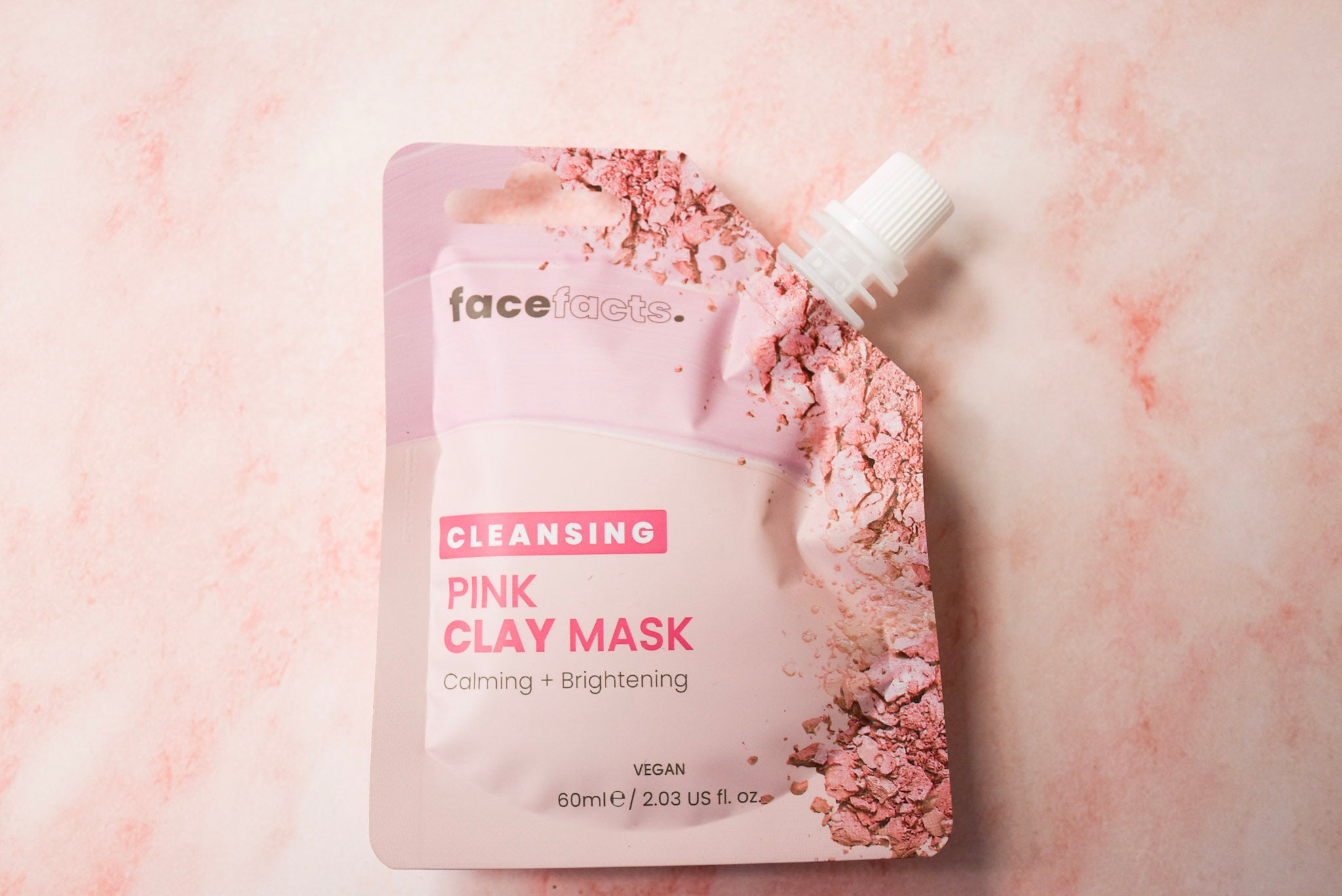A pink clay mask calming & brightening.