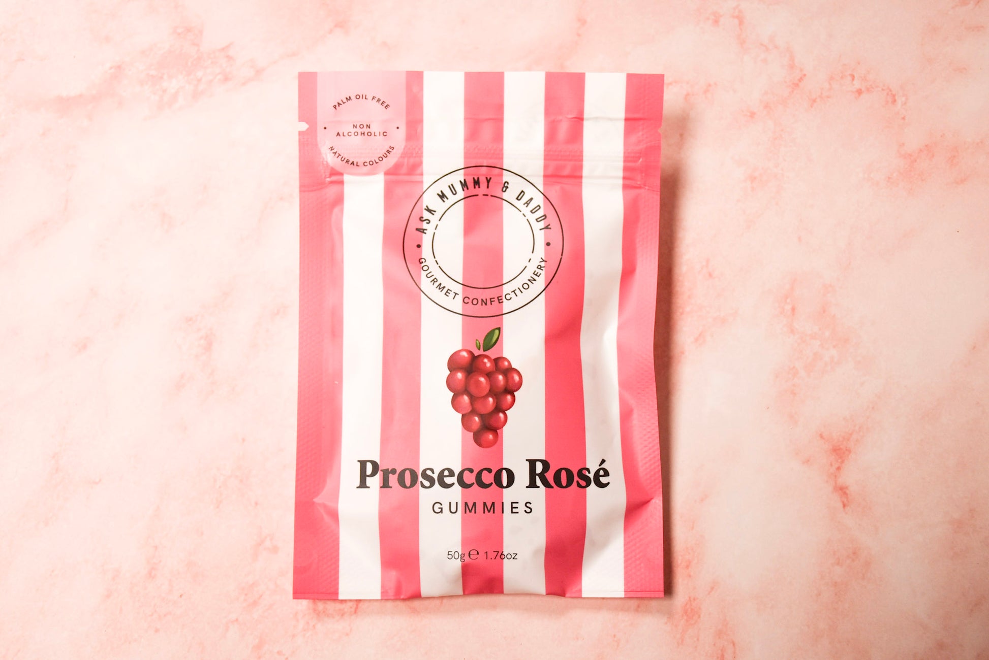 This image displays a package of "Prosecco Rose Gummies." The packaging features a vibrant, attractive design with vertical stripes in shades of pink and white.