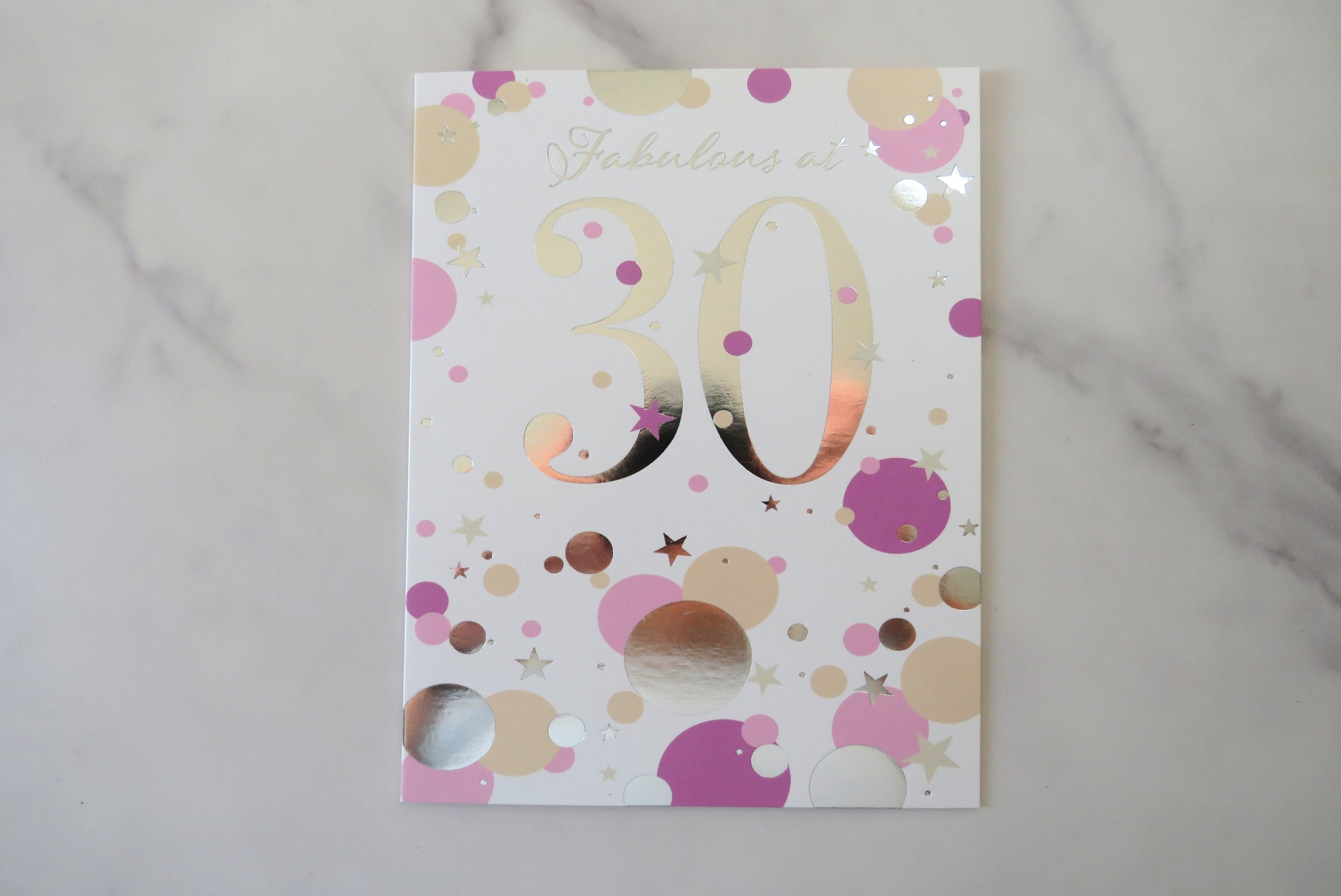 Greeting card with 'Fabulous at 30' text.