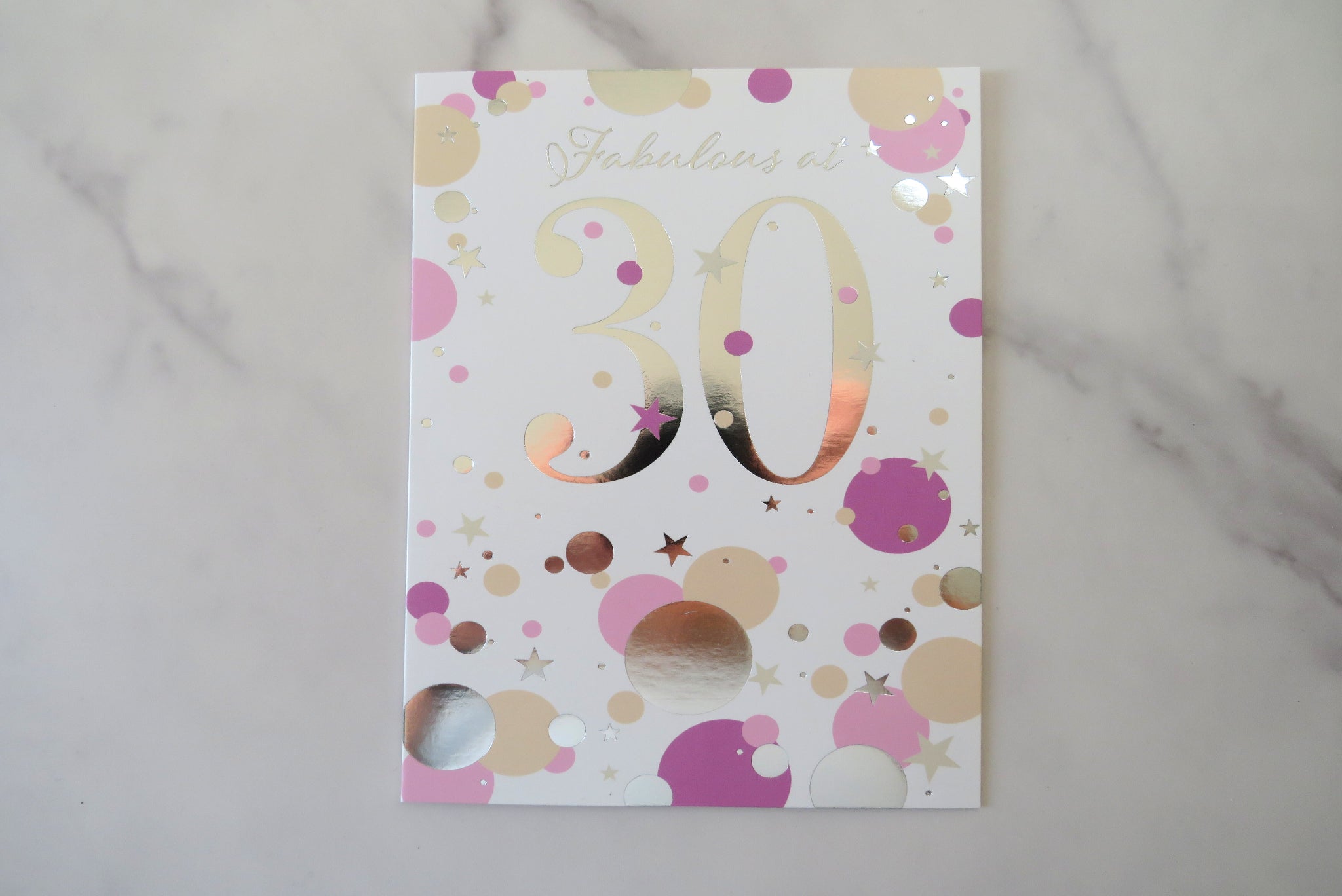 Greeting card with 'Fabulous at 30' text.