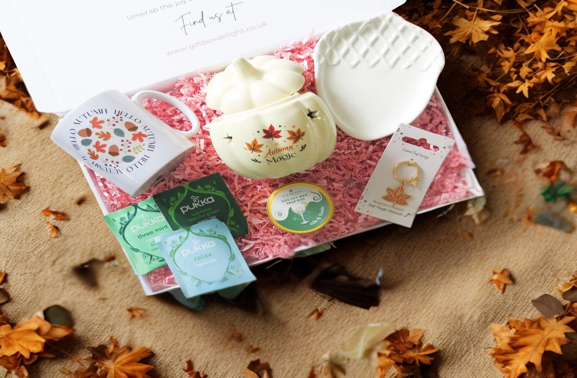 Gift set with hello autumn mug, autumn magic ceramic oil/wax burner, acorn ceramic dish, Pukka tea bag selection, gin & tonic scented soy wax melt & autumn leaf keyring.