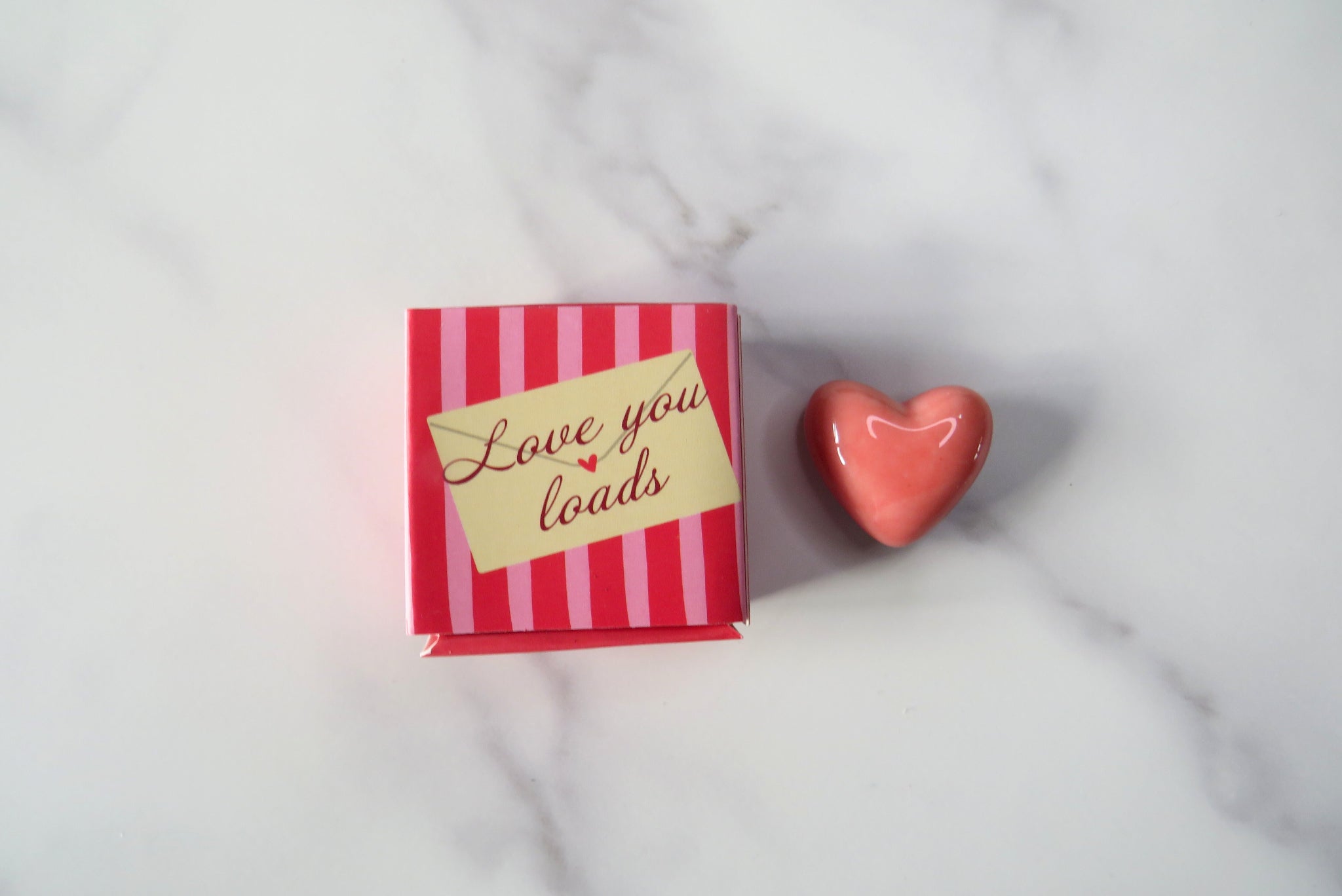 miniature red heart token